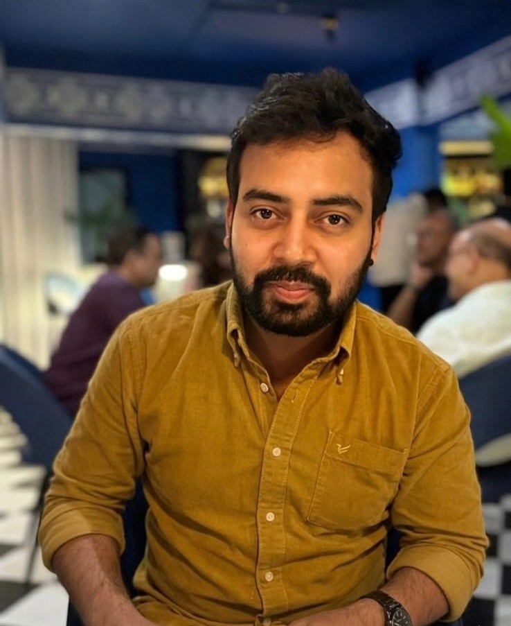 Vasu Garg — Associate Director